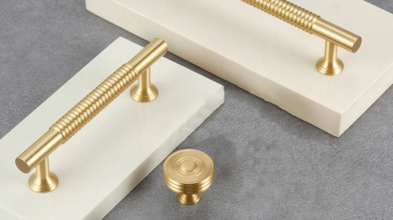 Textured brass cabinet pulls and bar handles in gold finish