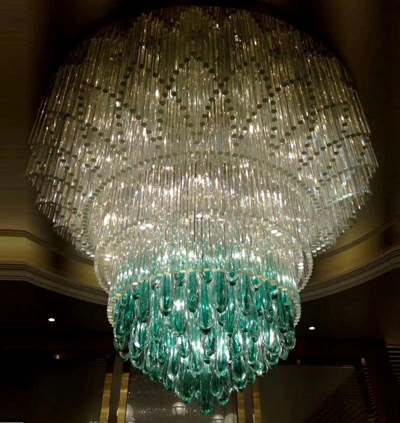 Brass-gold and teal oval crystal chandelier with long hanging bead curtains