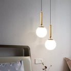Modern Elegance Meets Warmth: Opal Glass Globe Pendant Light