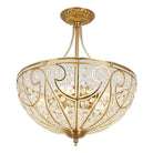 Gold-tone flush-mount chandelier close-up with crystal-style cutouts and ornate filigree pattern