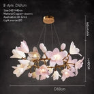 Ceramic flower chandelier with pink and white blossoms, round gold canopy and hanging rods