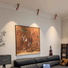 Walnut wood-grain LED spotlights installed on ceiling with a sofa and wall art nearby