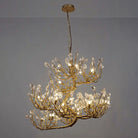 Crystal chandelier with gold-toned branch frame and hanging clear crystal prisms