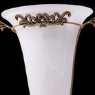 Ornate gold wall sconce with frosted glass shade, front view