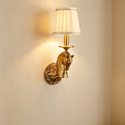 Decorative wall sconce with copper horse-head design and beige fabric drum shade